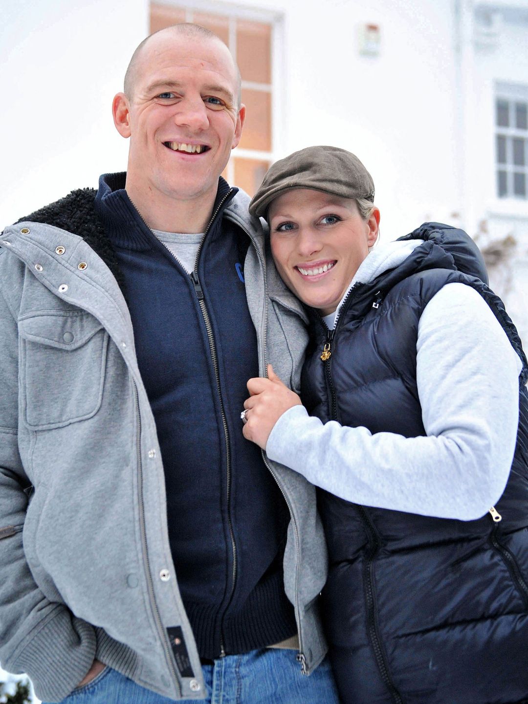 Zara Phillips, daughter of Princess Anne, and grand-daughter of Britain's Queen Elizabeth II, poses for a photograph with her fiance, England rugby player Mike Tindall, after the announcement of their engagement, at their home in Gloucestershire, south west England on December 21, 2010
