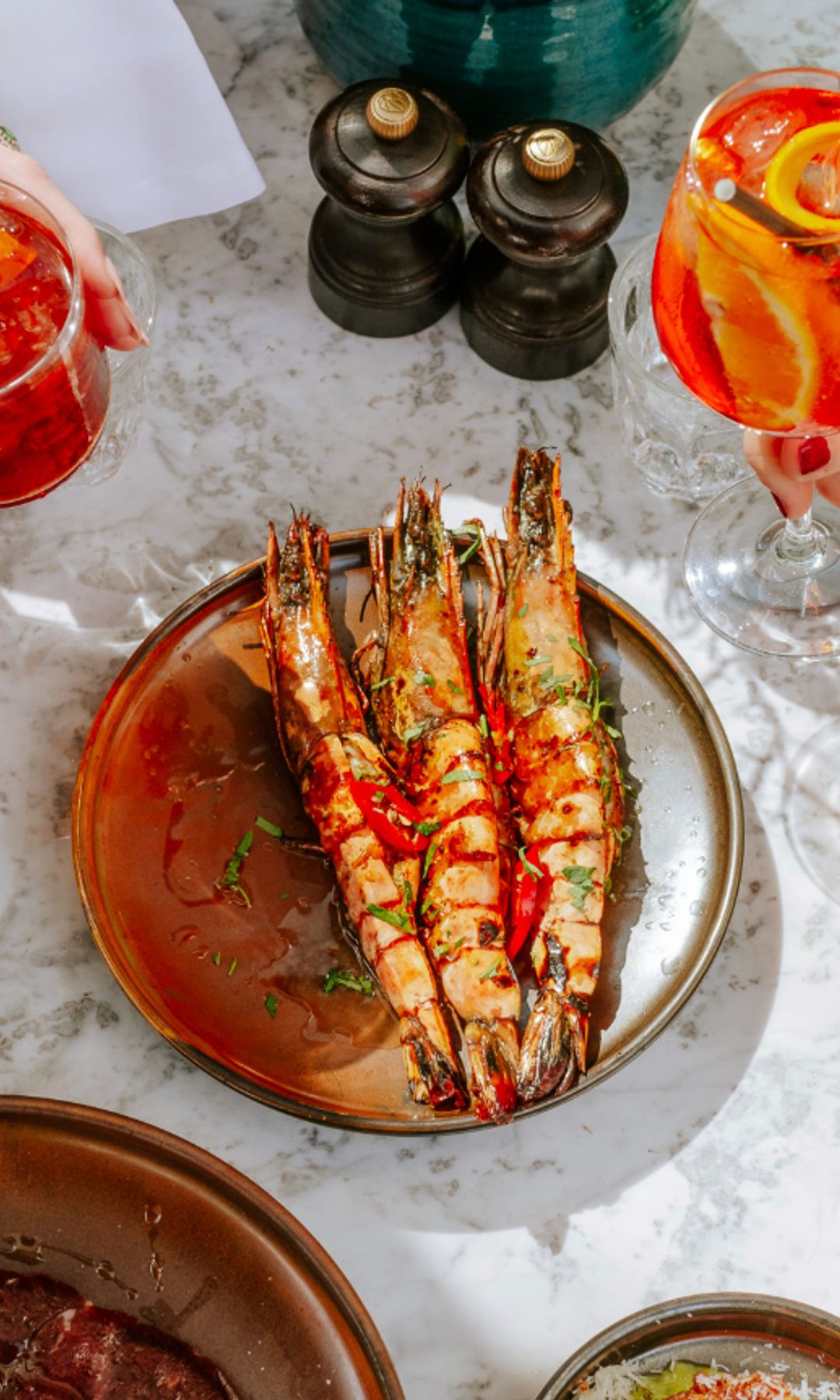 italian breakfast with aperol and prawns