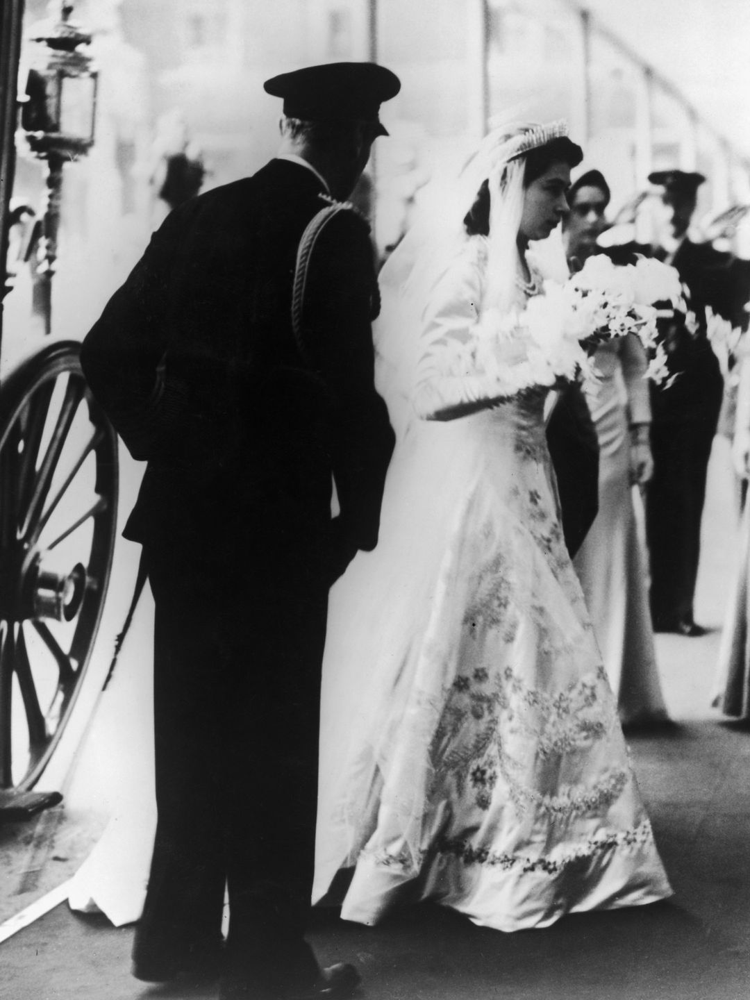 The Queen arriving at Westminster Abbey in a wedding dress