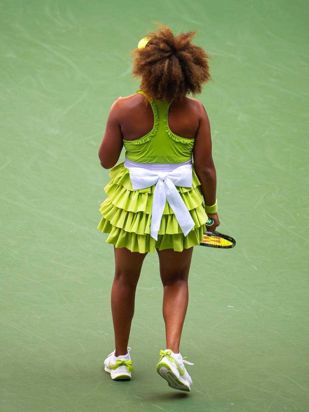 Naomi Osaka of Japan in action against Jelena Ostapenko of Latvia in the first round on Day 2 of the US Open at USTA Billie Jean King National Tennis Center on August 27