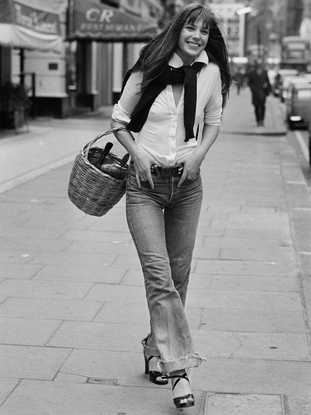 Jane Birkin carrying a basket bag 