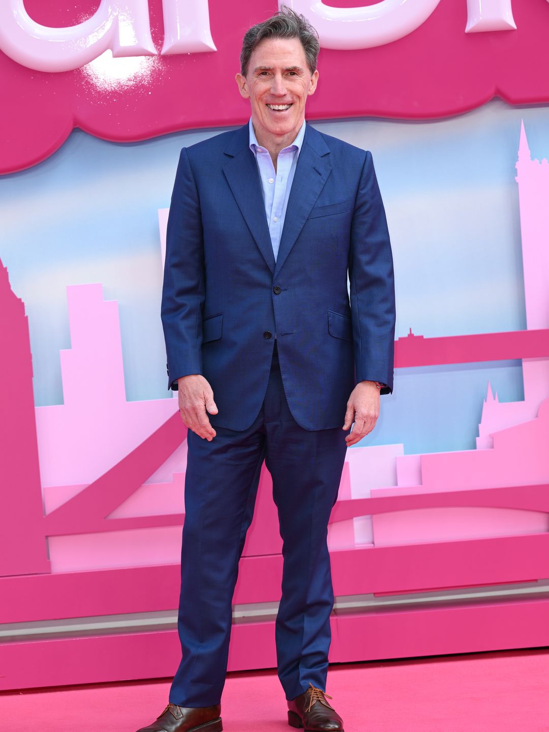 Rob Brydon in a blue suit at the Barbie premiere