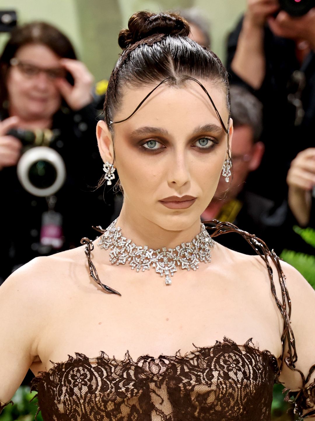 Emma Chamberlain in gothic makeup and a lace dress at the Met Gala