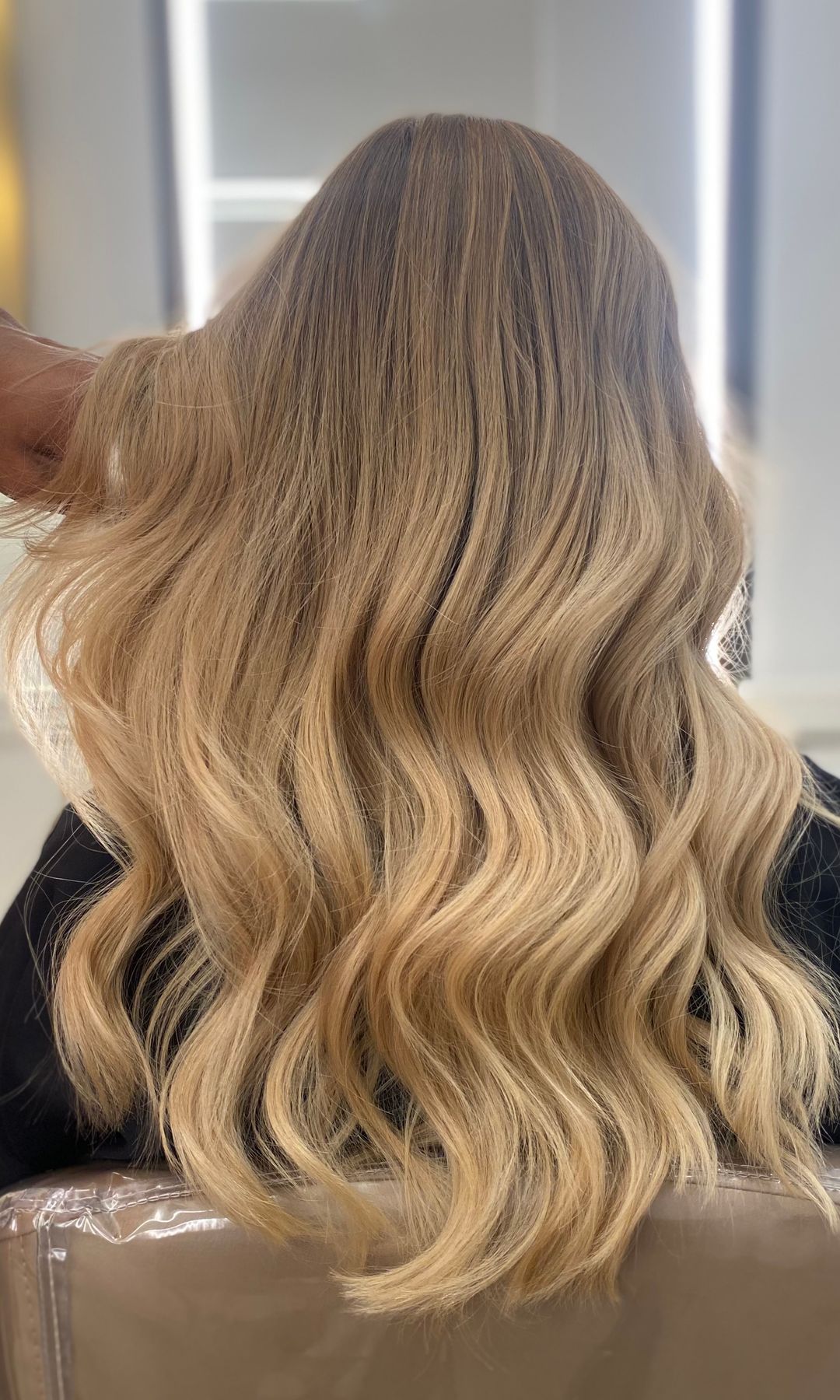 The back of wavy bronde hair