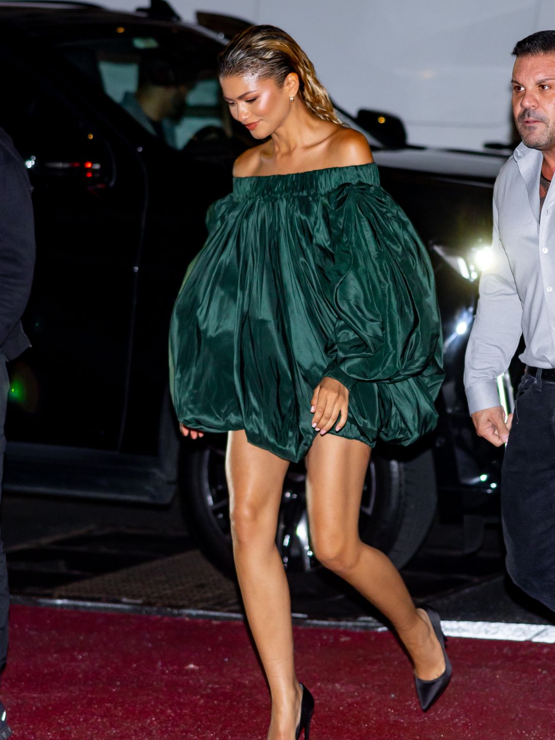 : Zendaya is seen in Midtown on September 21, 2024 in New York City wearing a green Louis Vuitton bubble dress