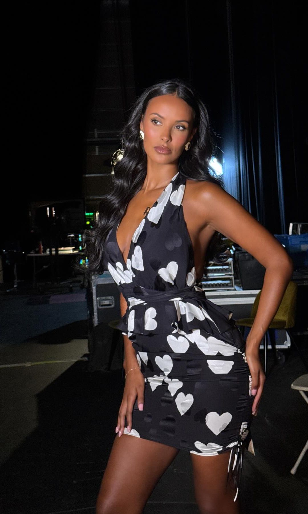 Maya Jama poses in a heart print mini dress on her instagram