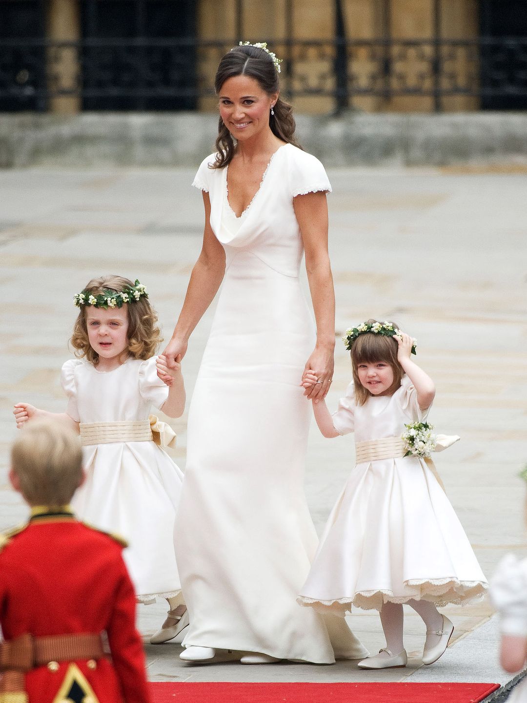 Apil 2011, Pippa Middleton with Grace van Cutsem (L) and Eliza Lopez (R) arrive for the marriage of Their Royal Highnesses Prince William Duke of Cambridge and Catherine Duchess of Cambridge at Westminster Abbey on April 29, 2011 in London, England. (Photo by Samir Hussein/WireImage)