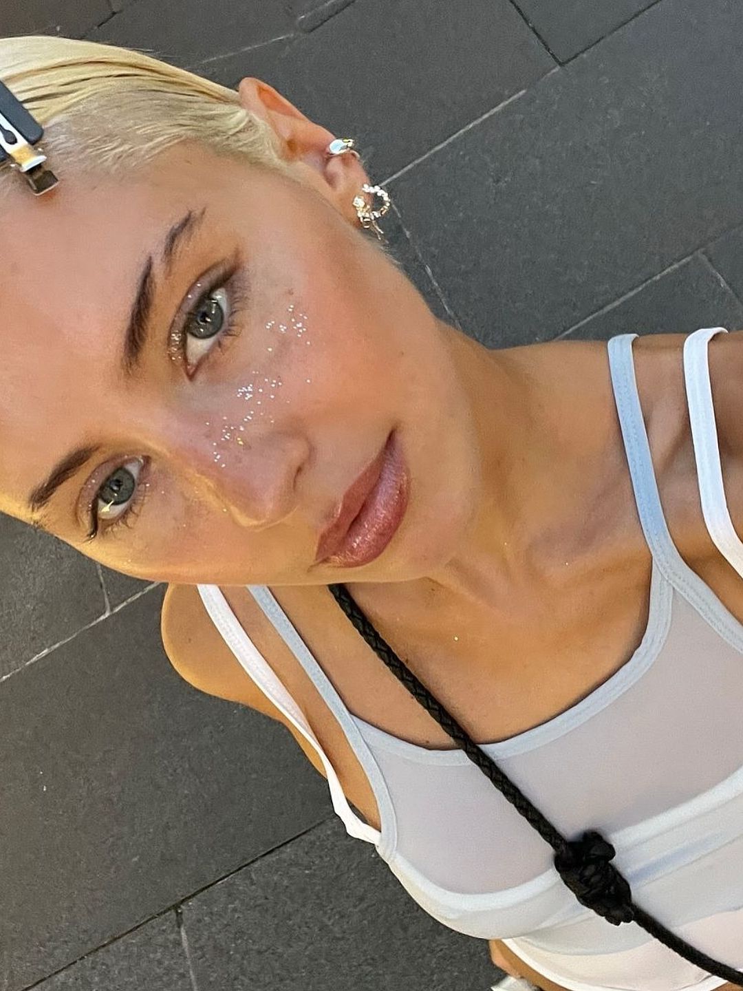 Iris Law shared a selfie in a layered tank top 