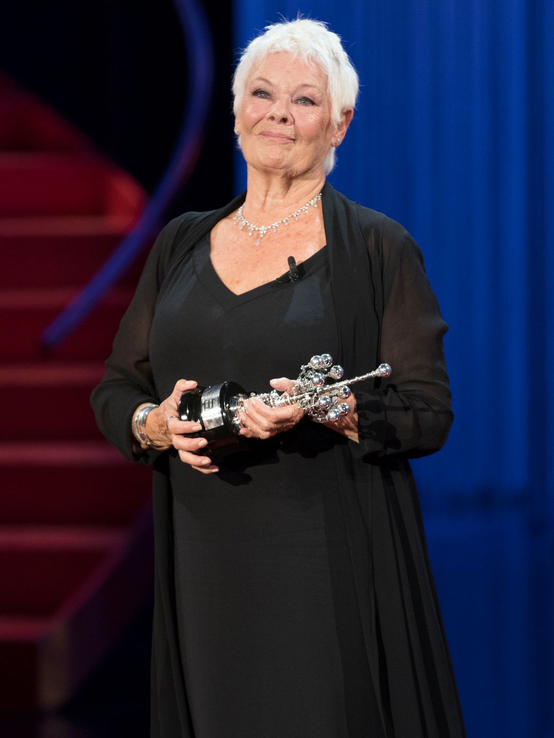 judi dench in a black dress