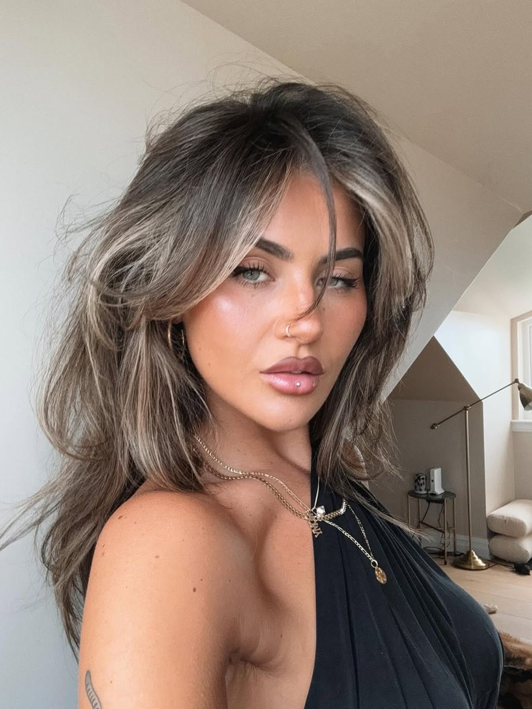 jamie genevieve poses to camera