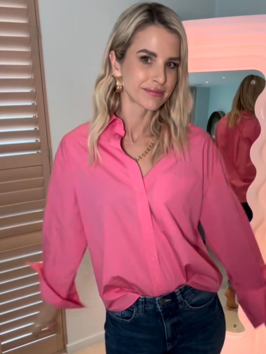 vogue williams in pink shirt and jeans 