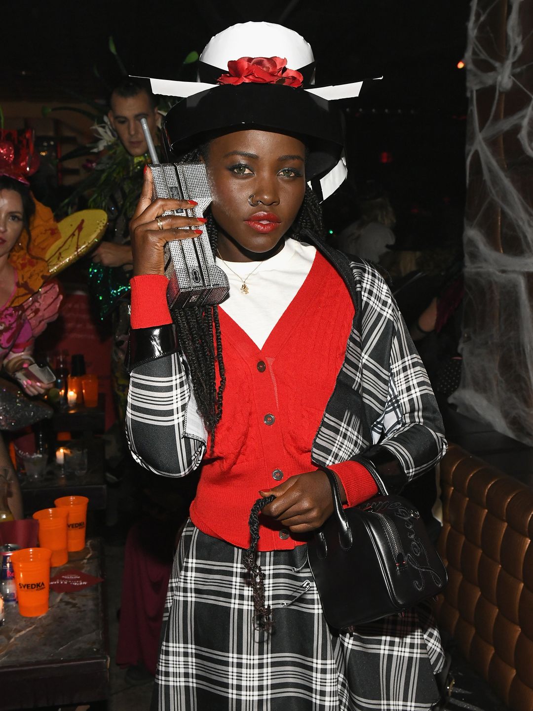 Lupita Nyong'o dressed as Dionne from Clueless