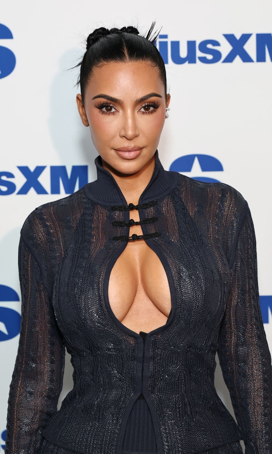 Kim Kardashian attends SiriusXM's Town Hall with the cast of "All's Fair" hosted by Andy Cohen at SiriusXM Studios on October 27, 2025 in New York City