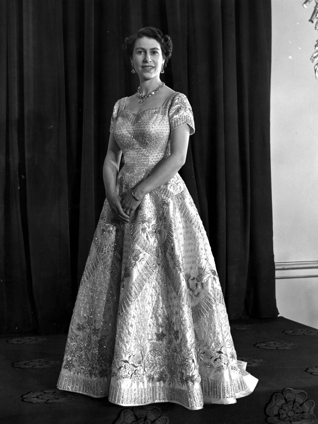 Queen Elizabeth II wearing her Coronation gown designed by Norman Hartnell 