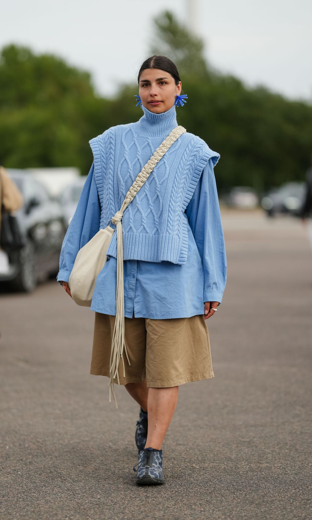 A guest wears all blue outside Cecilie Bahnsen, during Copenhagen Fashion Week 