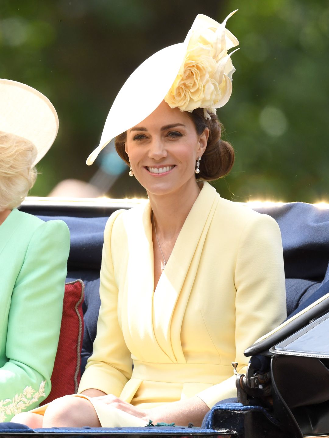 Princess Kate wearing yellow outfit 