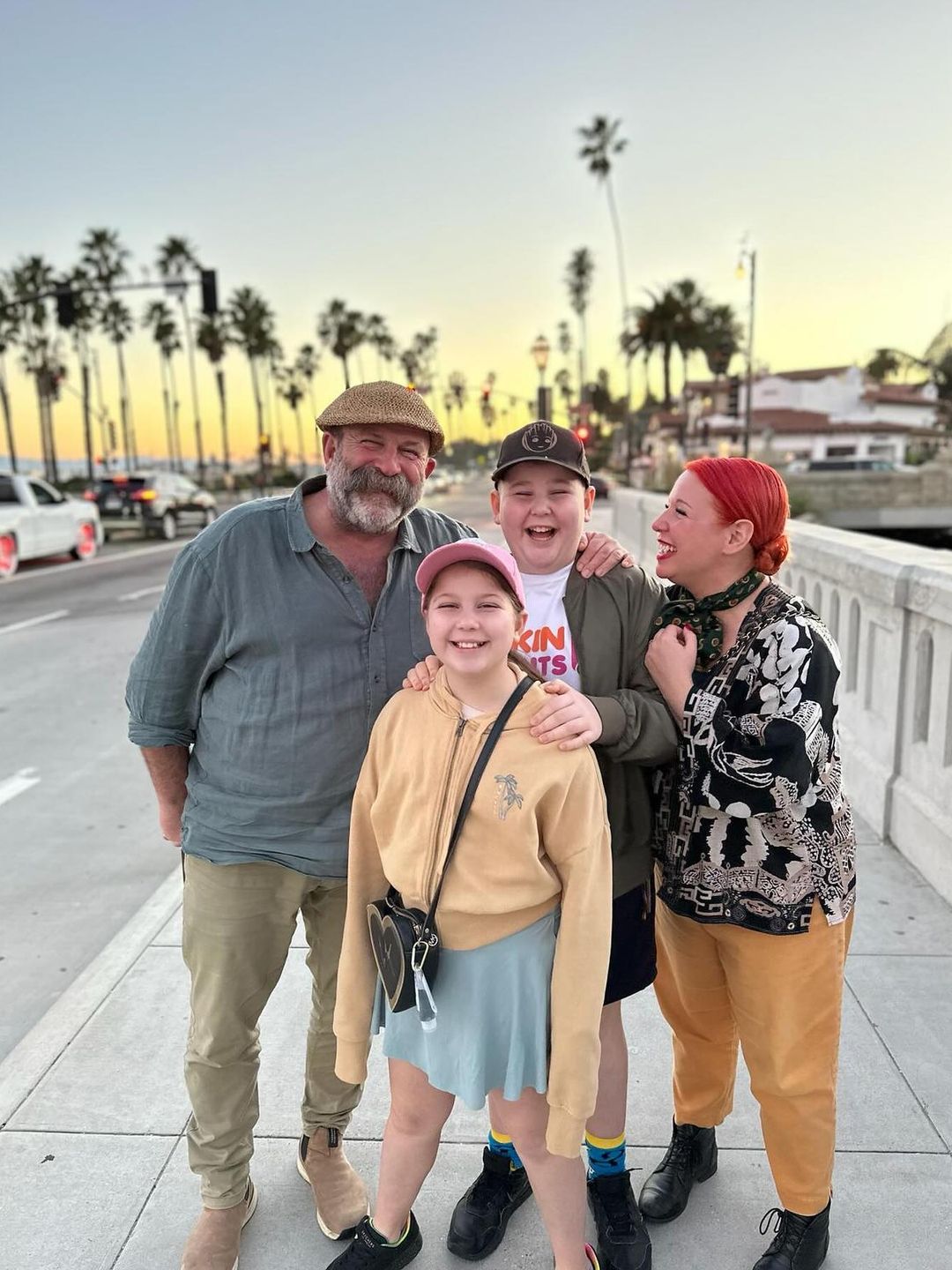 family in america posing with sunset