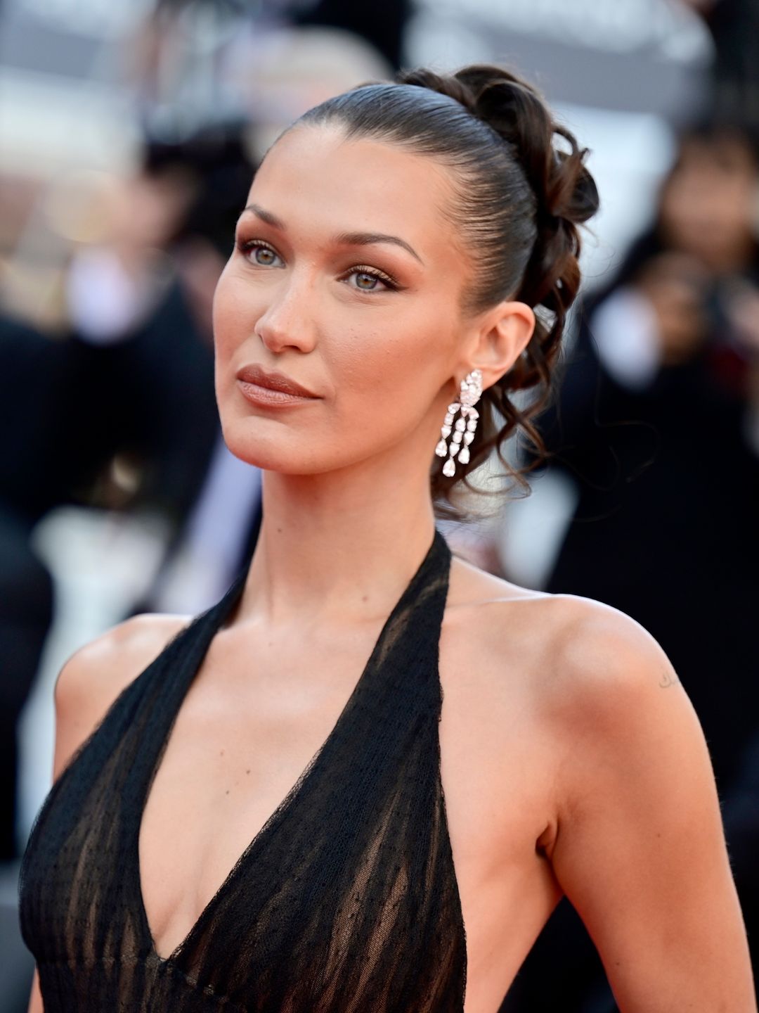 Bella Hadid attends the "L'Amour Ouf" (Beating Hearts) Red Carpet at the 77th annual Cannes Film Festival at Palais des Festivals on May 23, 2024 in Cannes, France