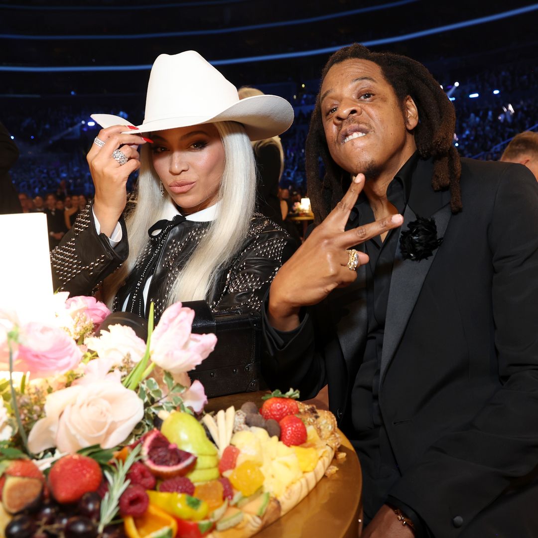 Beyoncé and Jay-Z twin in sharp gray suits on star-studded date