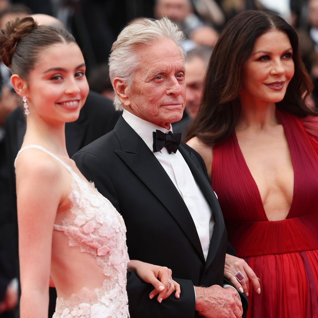 Michael Douglas and Catherine Zeta-Jones' lookalike daughter shines in new photos of life away from famous family