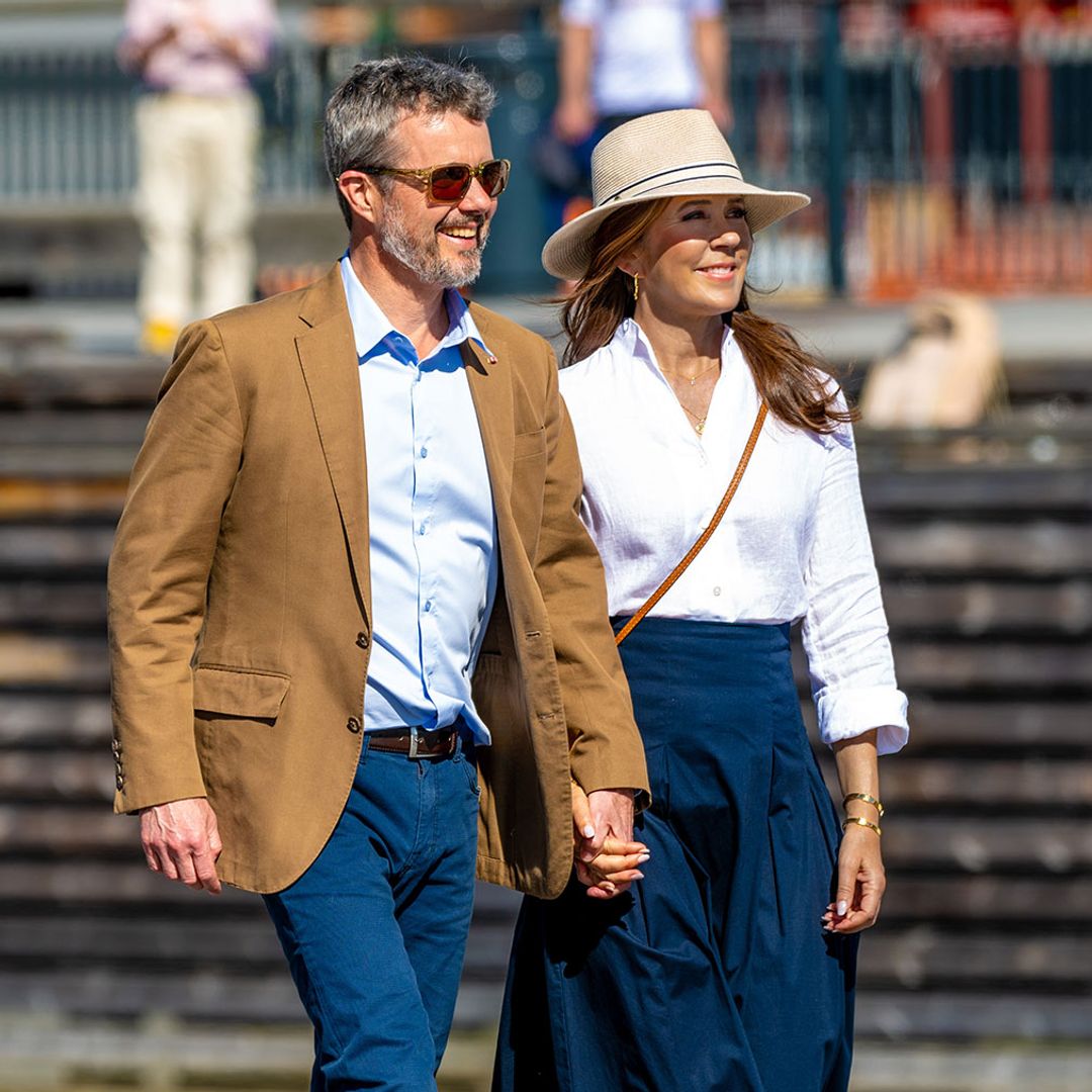 Queen Mary and King Frederik hold hands during romantic stroll in Norway