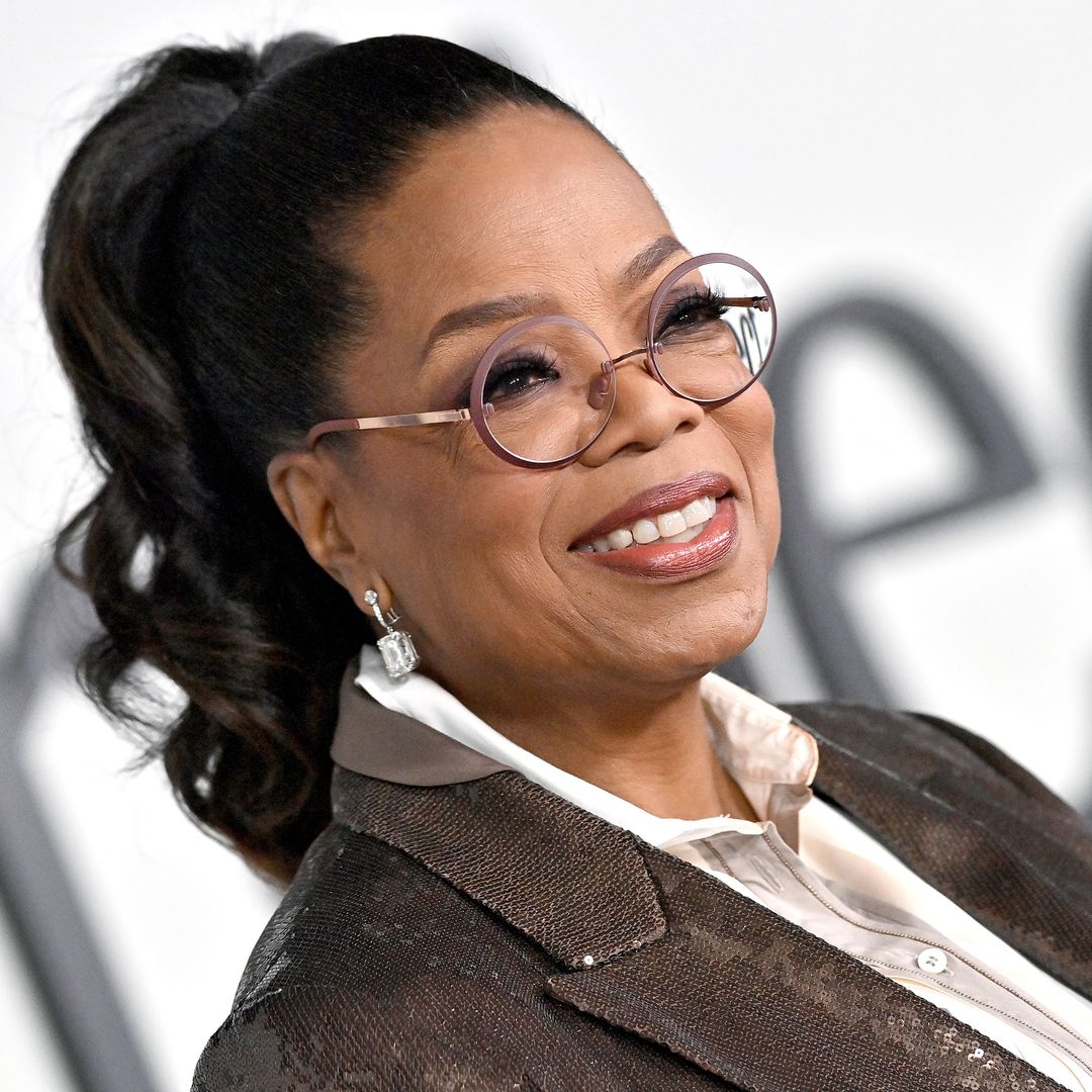 Oprah Winfrey, 70, is incredible in fitted flares with fabulous feathers