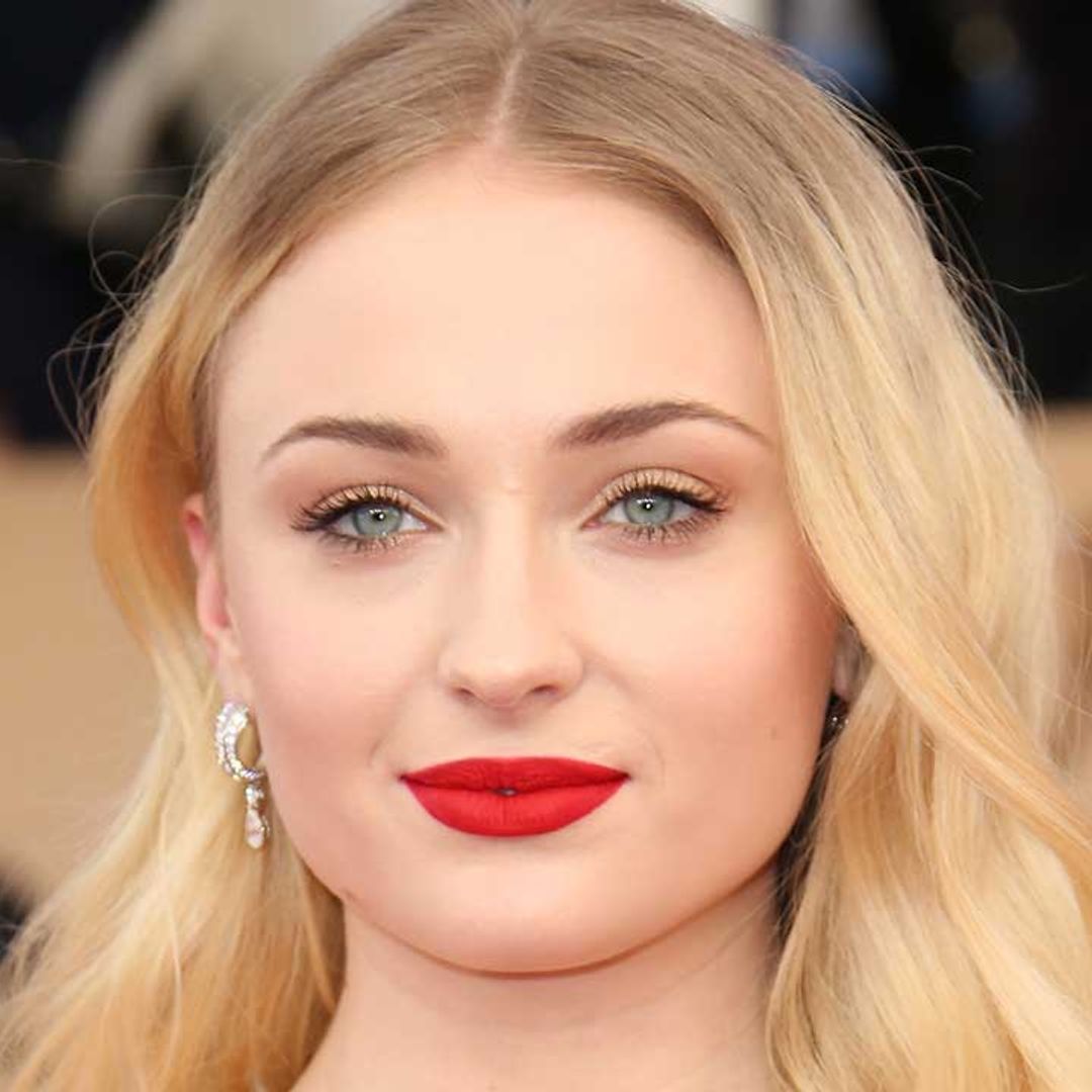 Sophie Turner stuns in white jeans while partying with the Beckhams