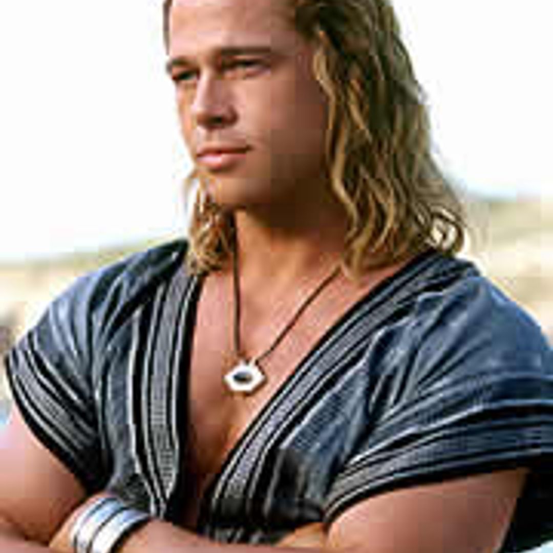 Brad Pitt  Midlength razor textured shag hairstyle for men