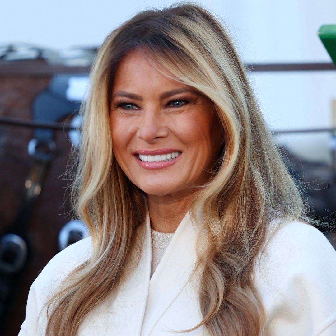 First Lady Melania Trump looks festive as she receives White House Christmas tree