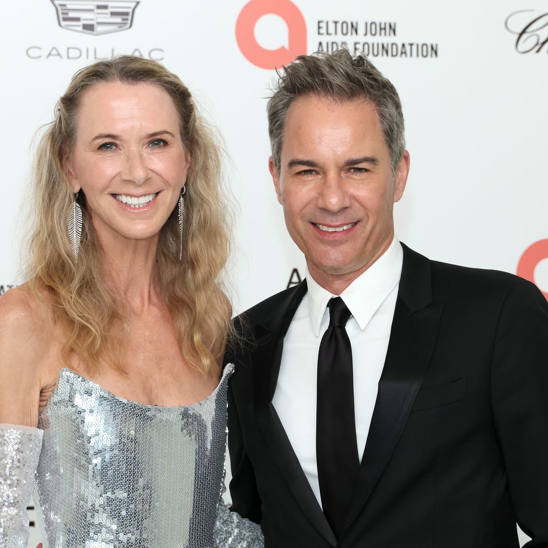 Eric McCormack joined by his ex wife at Elton John's Oscar viewing party months after filing for divorce