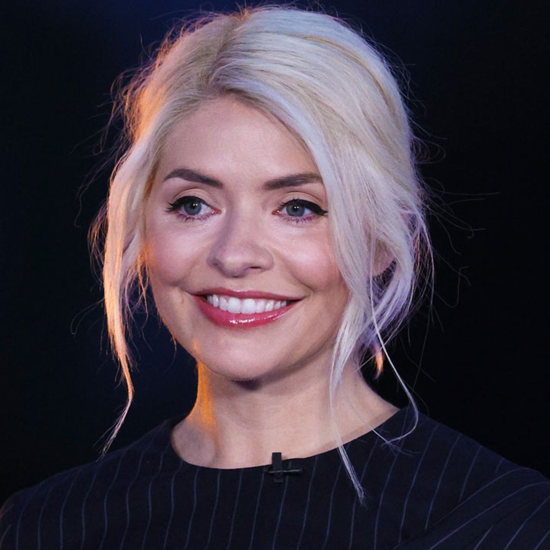 Holly Willoughby wows in cheerleading uniform – see her impressive stunt