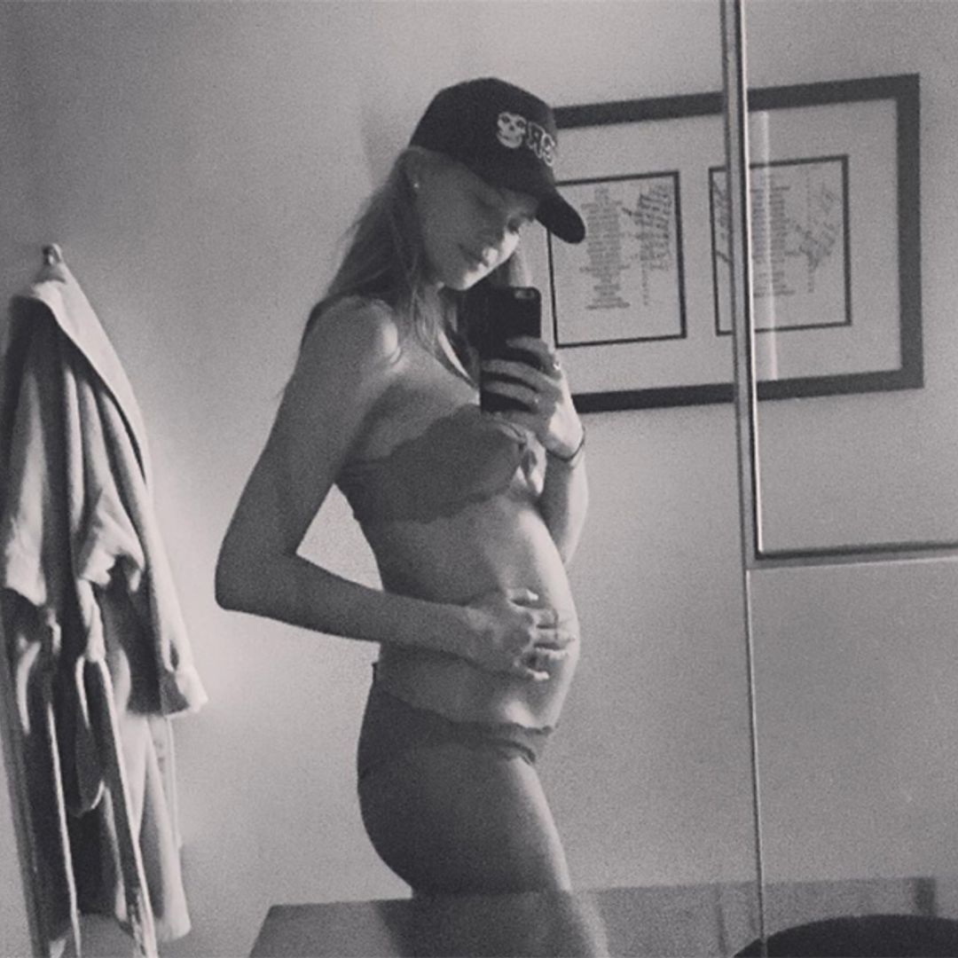 Adam Levine and Behati Prinsloo show off their matching 'baby bumps'