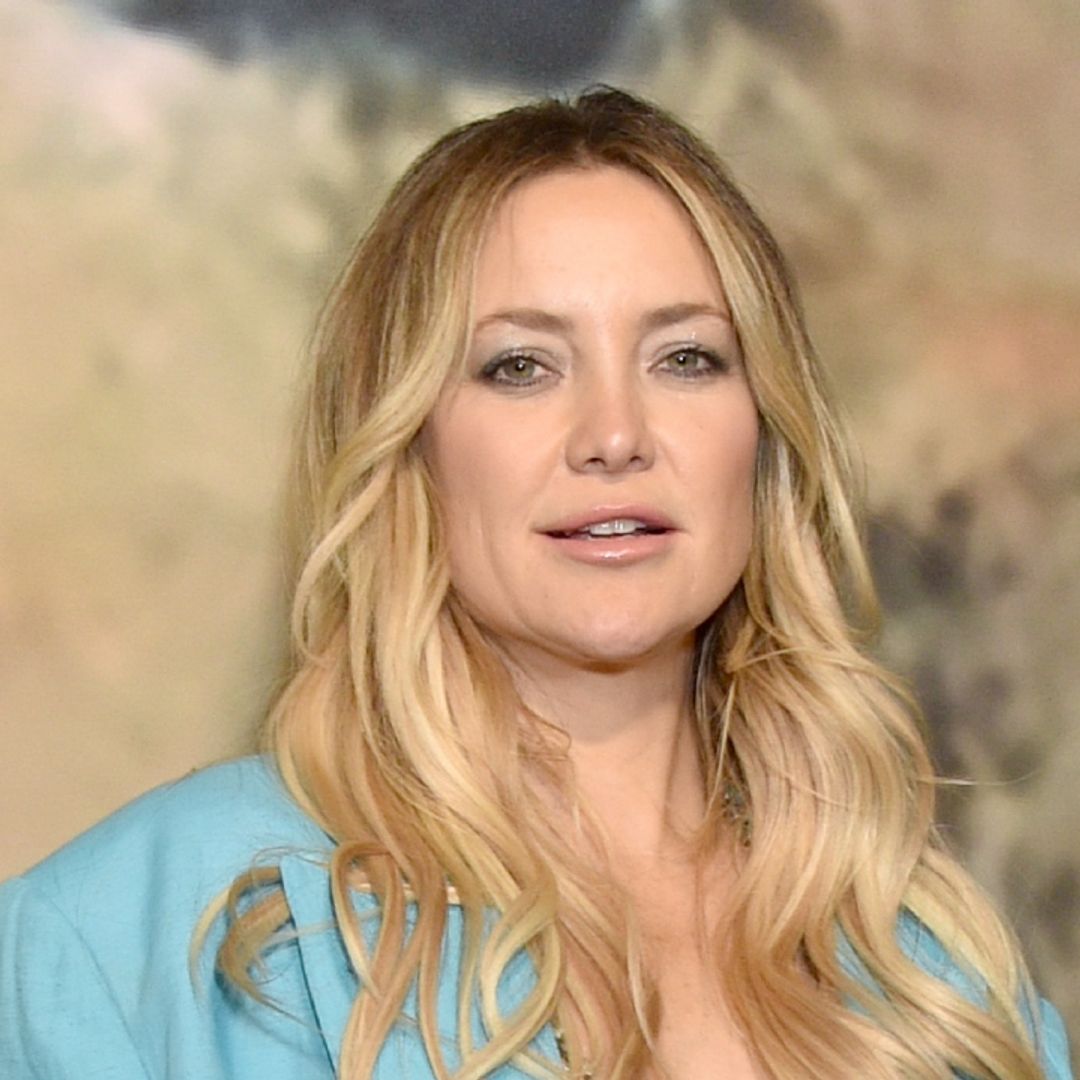 Kate Hudson shines on the red carpet in a fringed bra and skirt suit combo