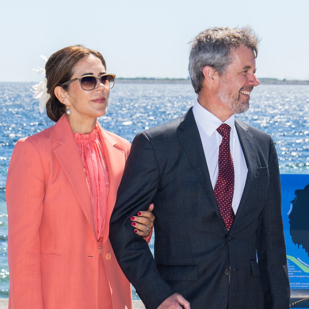 Queen Mary and King Frederik greeted with hugs and kisses during special reunion