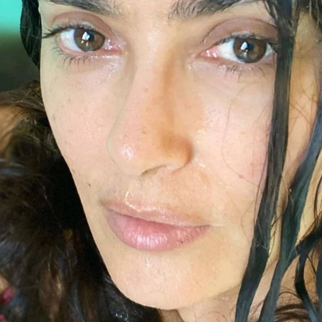 Salma Hayek looks fantastic in blue swimsuit and stylish sarong during trip to the beach