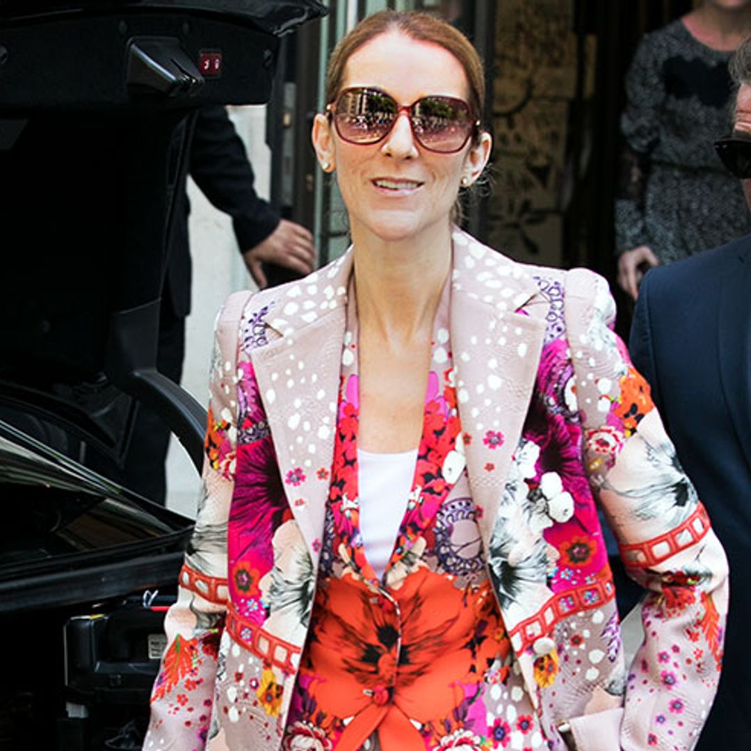 Céline Dion turns heads in a multi-coloured floral Roberto Cavalli suit
