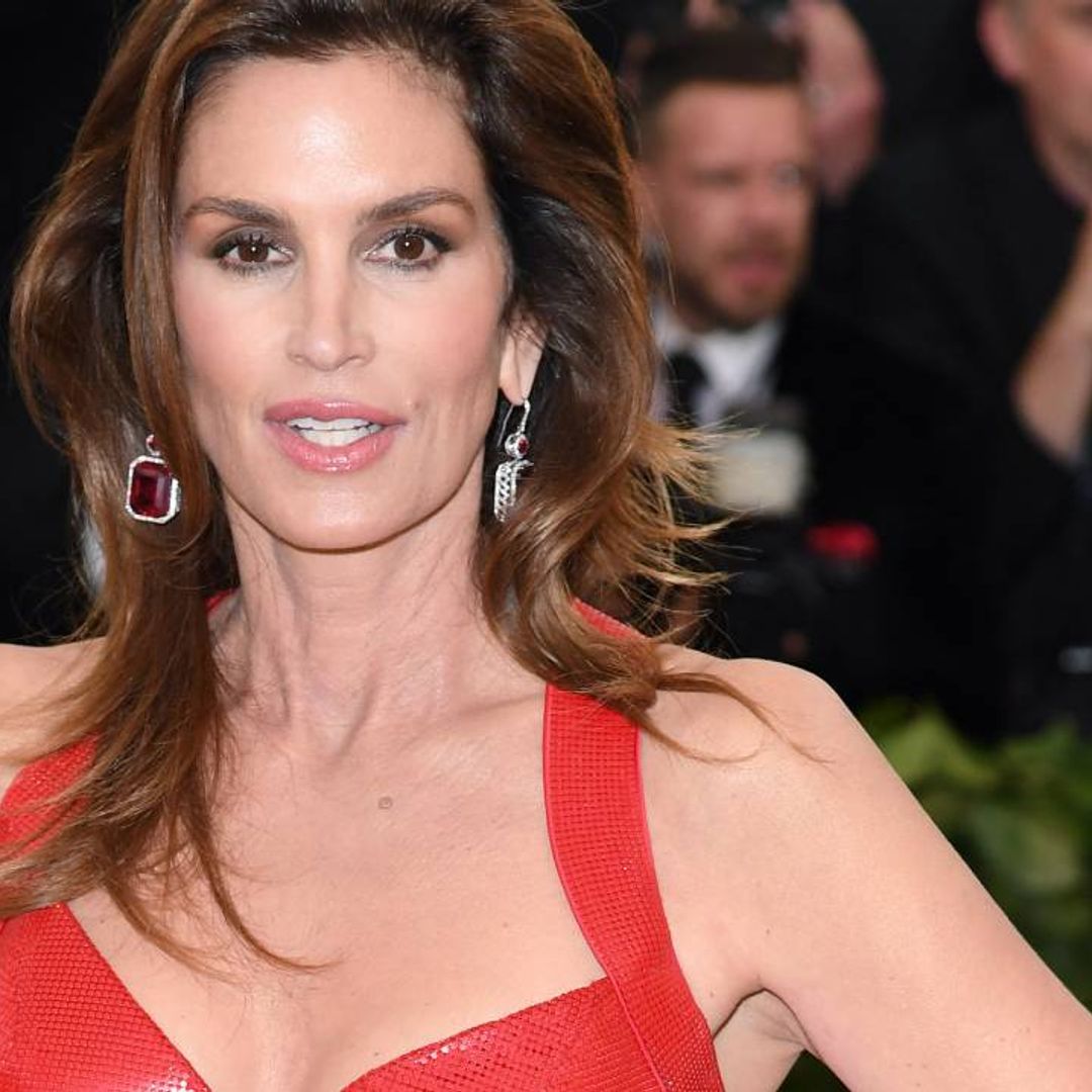 Cindy Crawford looks incredible in bright blue swimsuit for tropical photo