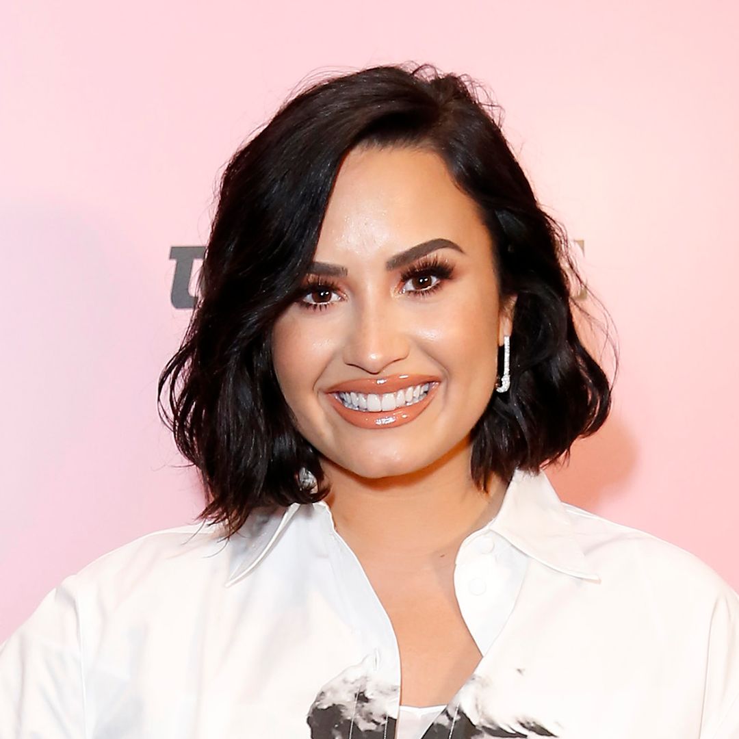 Demi Lovato displays slimmed-down physique in poolside photos