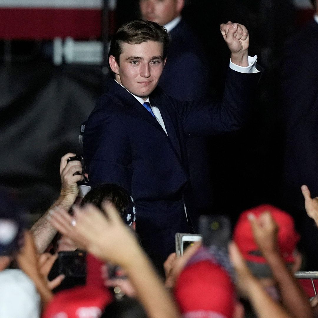 Barron Trump gestures after his father Republican presidential candidate former President Donald Trump introduced him during a campaign rally in Florida