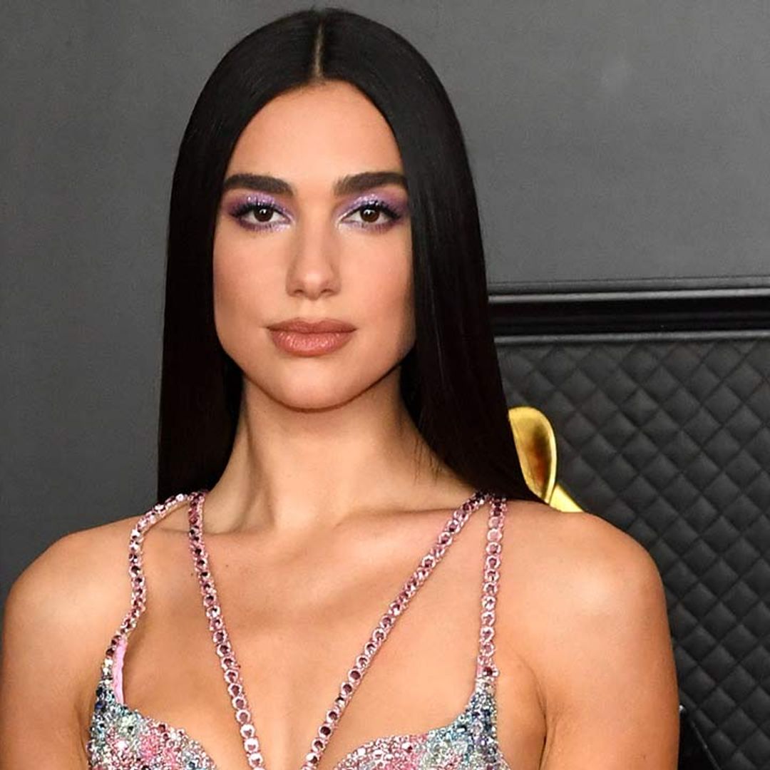 Dua Lipa commands attention in daring thigh-split skirt and ab-baring crop top