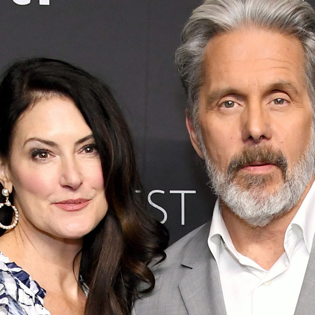 NCIS star Gary Cole's second wife models backless wedding dress for lakeside nuptials