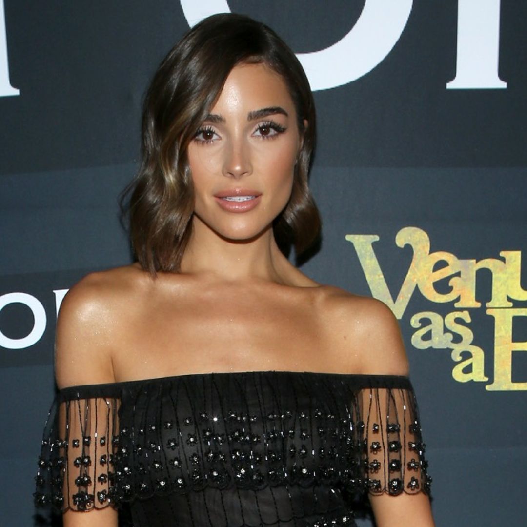 Olivia Culpo stuns with look-alike sisters in lush swimsuit video