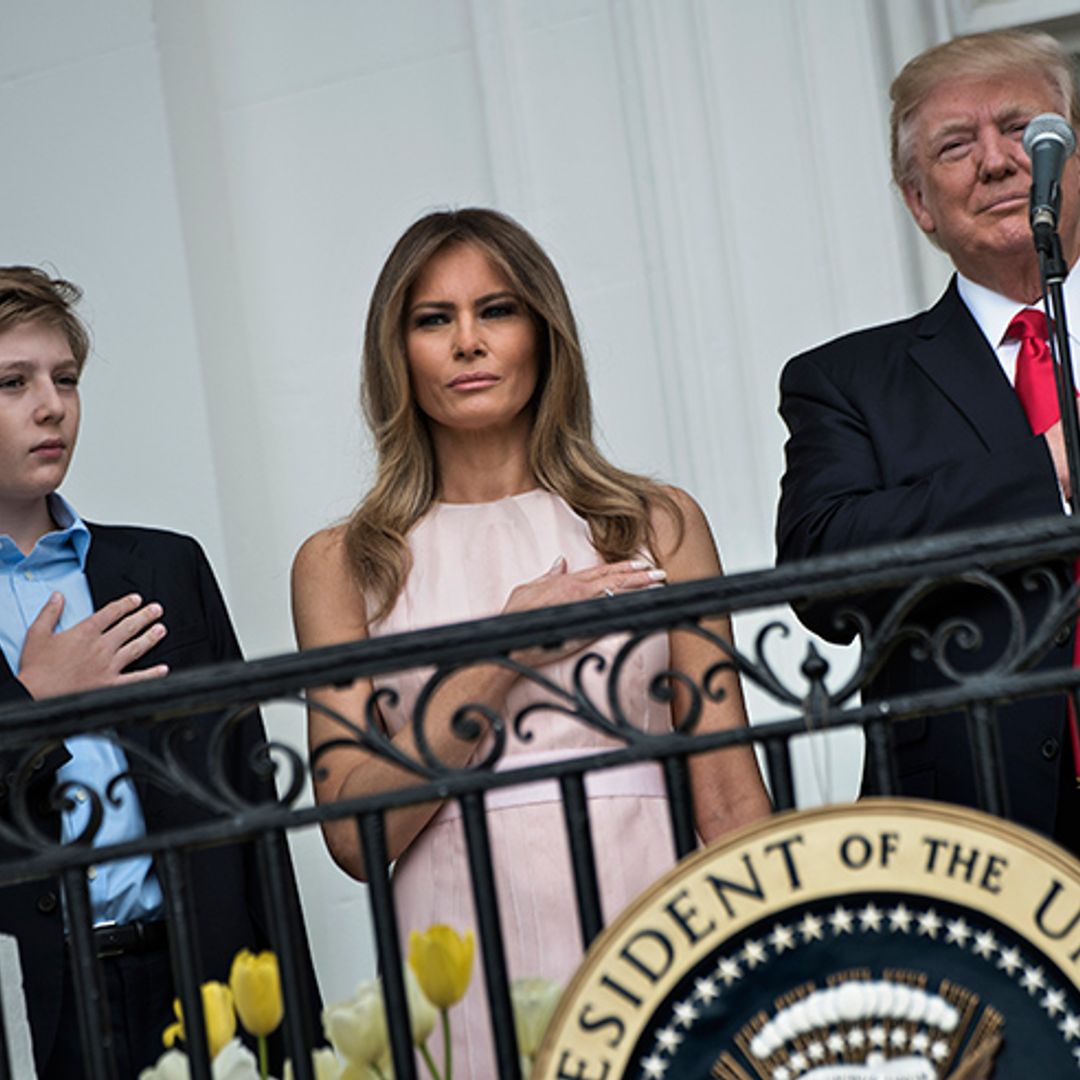 Watch Melania Trump remind husband Donald to raise hand for national anthem – and Twitter can't handle it