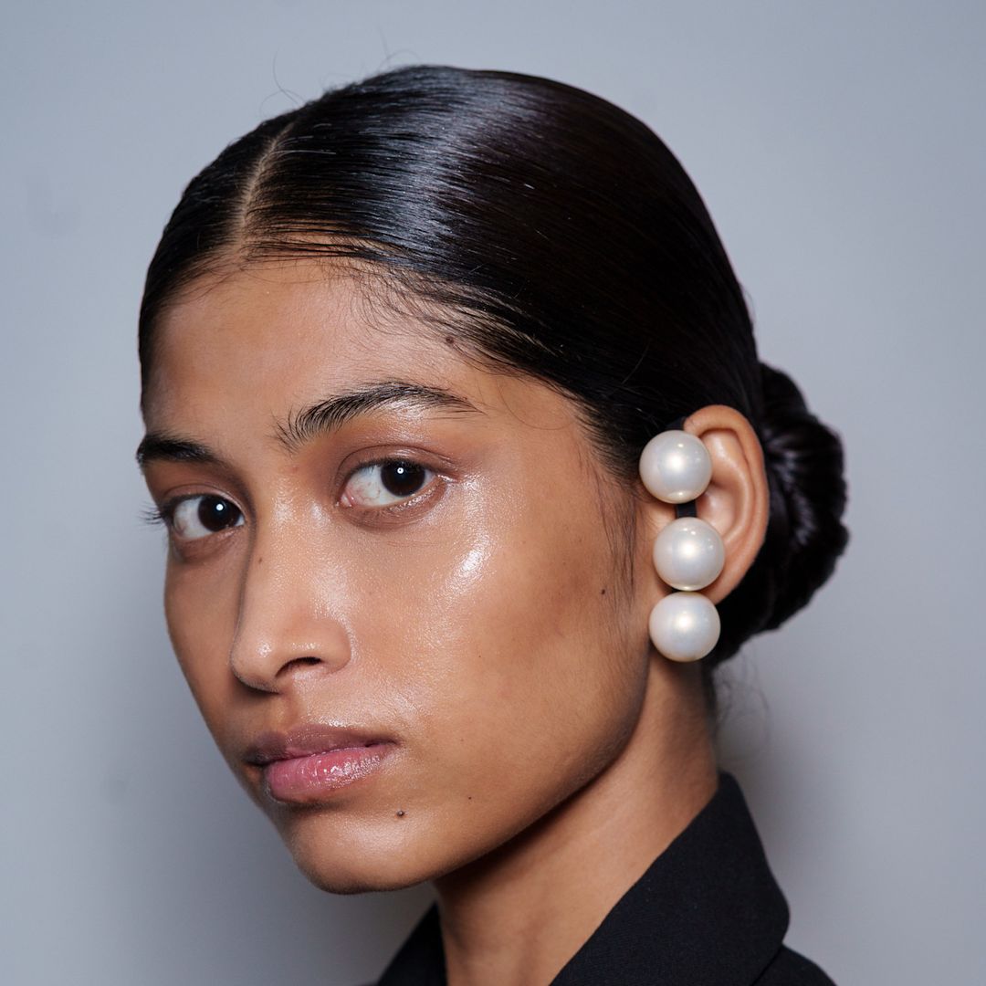 glass skin on a model at milan fashion week 