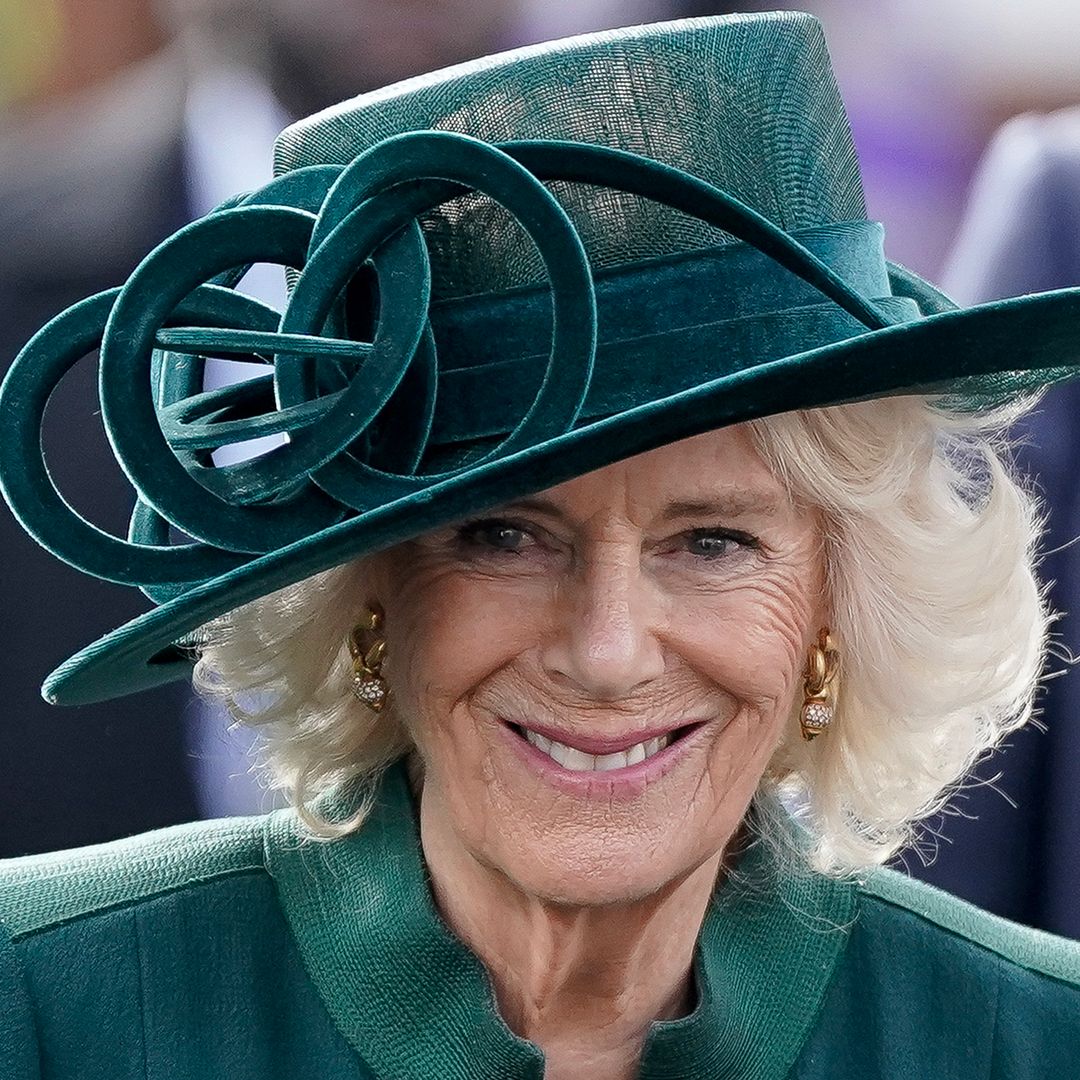 Queen Camilla surprises in knee-high boots and coatdress Princess Kate would love