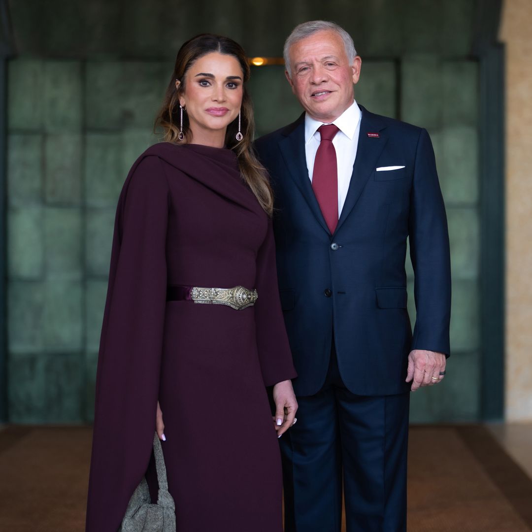 Queen Rania delights fans with rare PDA moment with King Abdullah