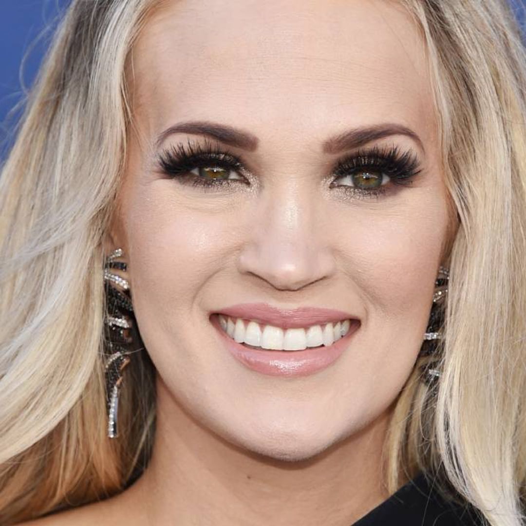 Carrie Underwood is the ultimate fashionista in metallic mini dress – and fans are saying the same thing
