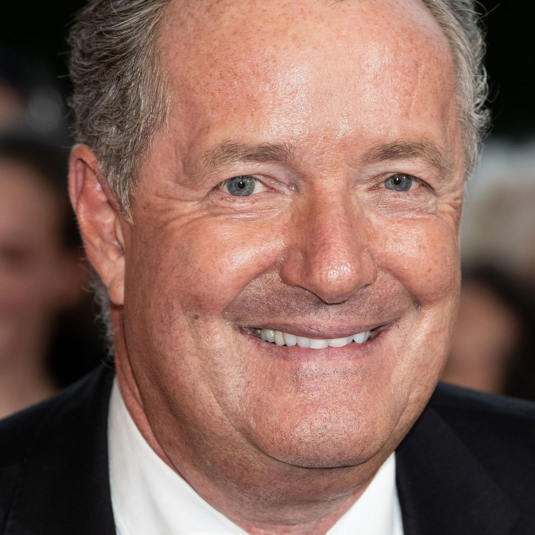 Piers Morgan is all smiles as he reunites with Susanna Reid at star-studded Christmas party