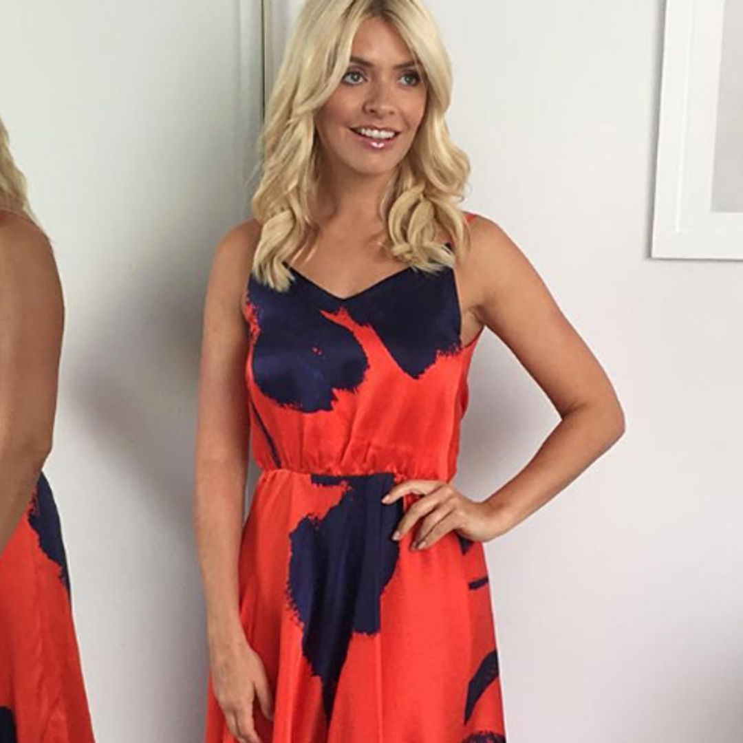 Holly Willoughby makes a summer fashion statement in a £385 red floral sun dress by Ellie Lines
