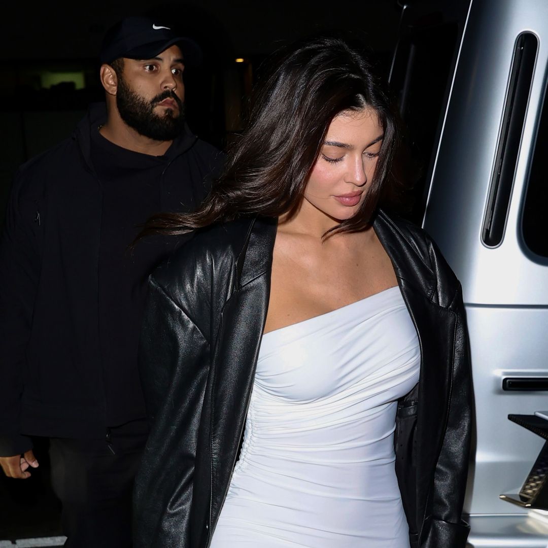 Kylie Jenner wows in skin tight little white dress on a girl's night in LA
